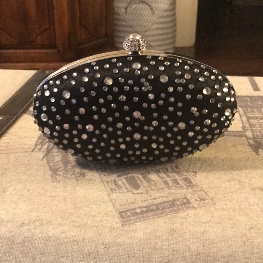 Evening clutch with silver shoulder strap